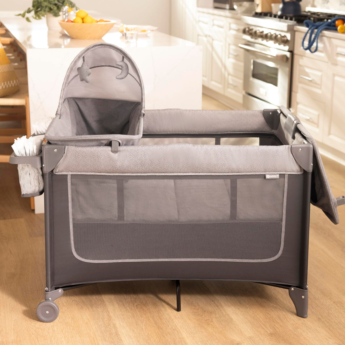 4-in-1 Portable Play Yard with Bassinet and Changer I26203